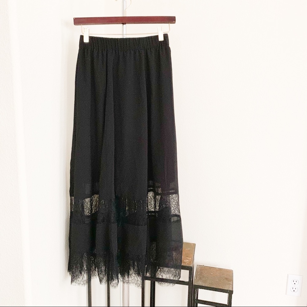 Midi Skirt With Sheer Lace Detailing.